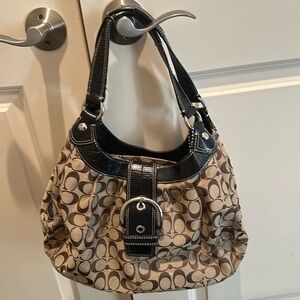 Classic Vintage Brown and Tan Coach over the shoulder bag with silver accents